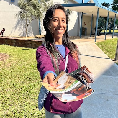 volunteer with leaflet